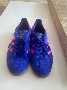 Gazelle Adidas hot pink and blue in suede. Size 6 but fits a 7. They run big.